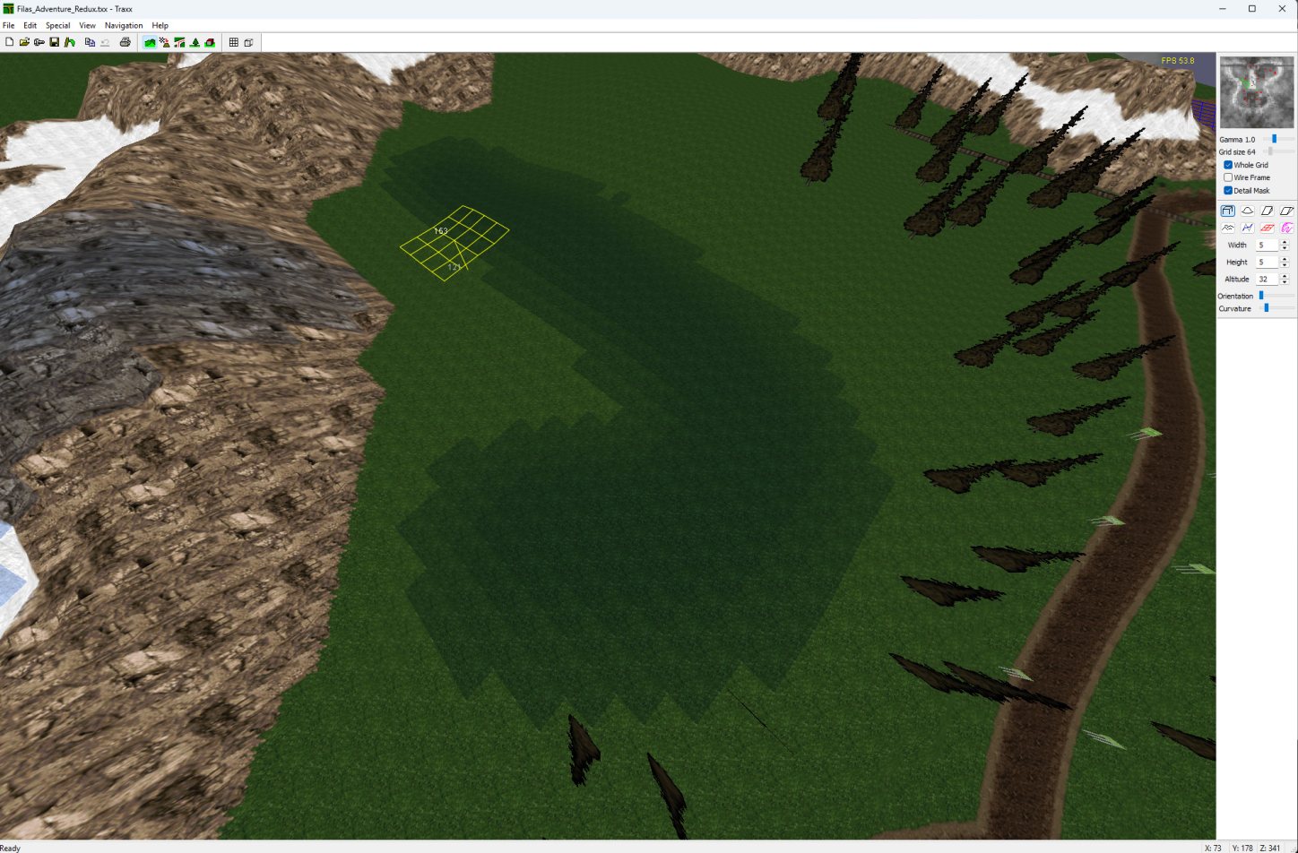 The Traxx 3D view with Detail Mask switched on, the painted area washed darker over the terrain